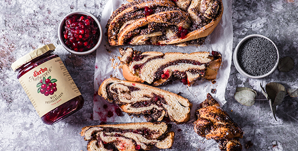 Braided almond and poppy seed cake with wild lingonberries